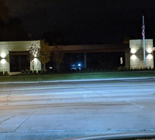 Picture of building from road at night